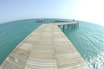 Wooden Deck Leading Into The Clear Waters Of The Mediterranean Sea Off Antalya
